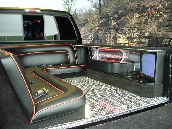 F250 limousine interior: leather seating, television and diamond plate floor